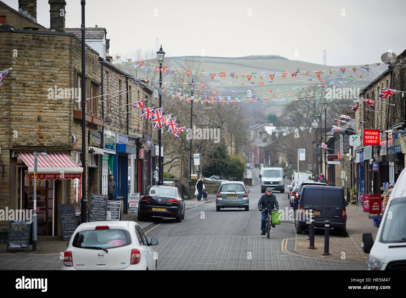 Bunting and flags flying on Hare Hill Road, ,Littleborough Village