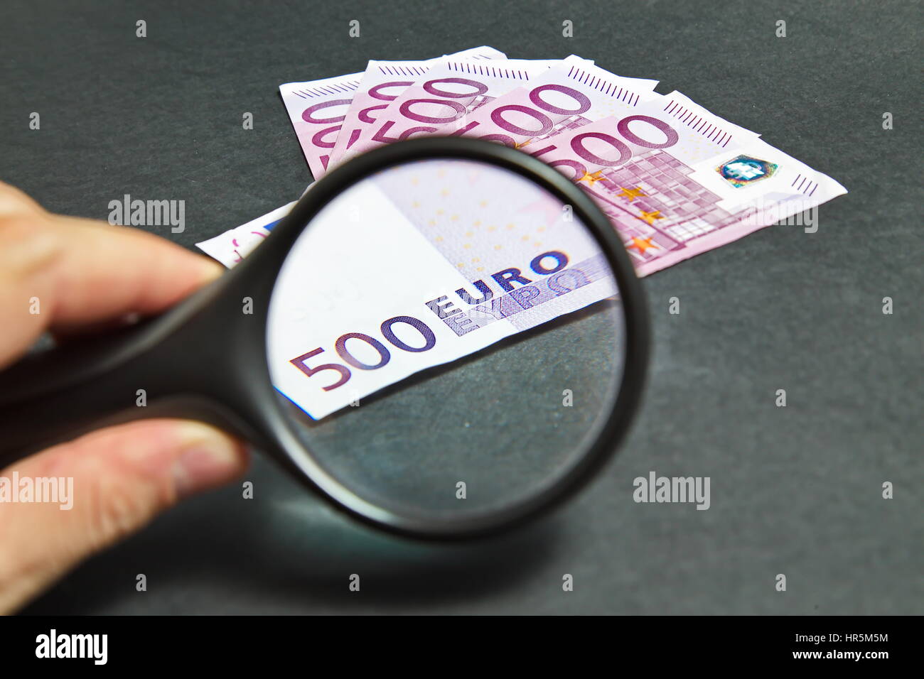Magnifying Glass on the five hundred bill Euros Stock Photo