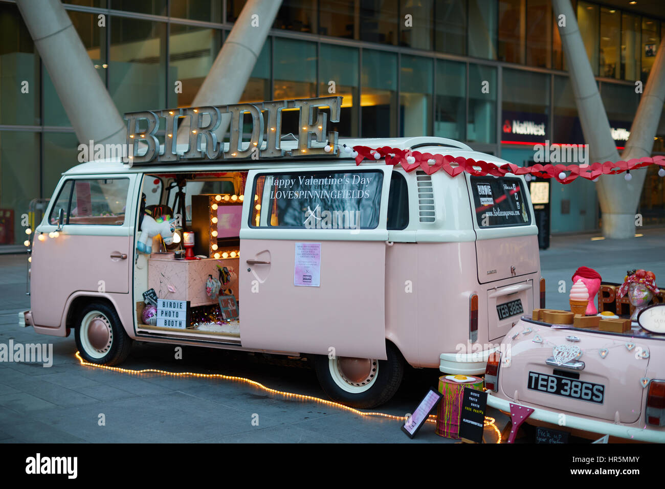 A pink Volkswagen camper van photo booth with Mini trailer at Number 1 The  Avenue Spinningfiled Square, Manchester, England,UK Stock Photo - Alamy