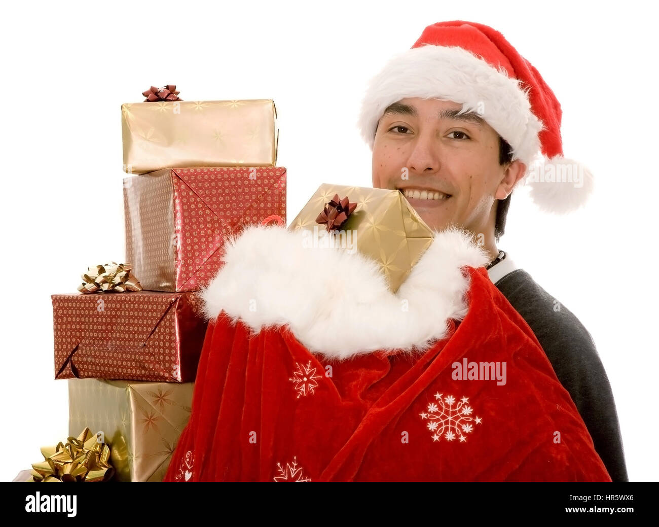 santa claus full of gifts over a white background Stock Photo - Alamy