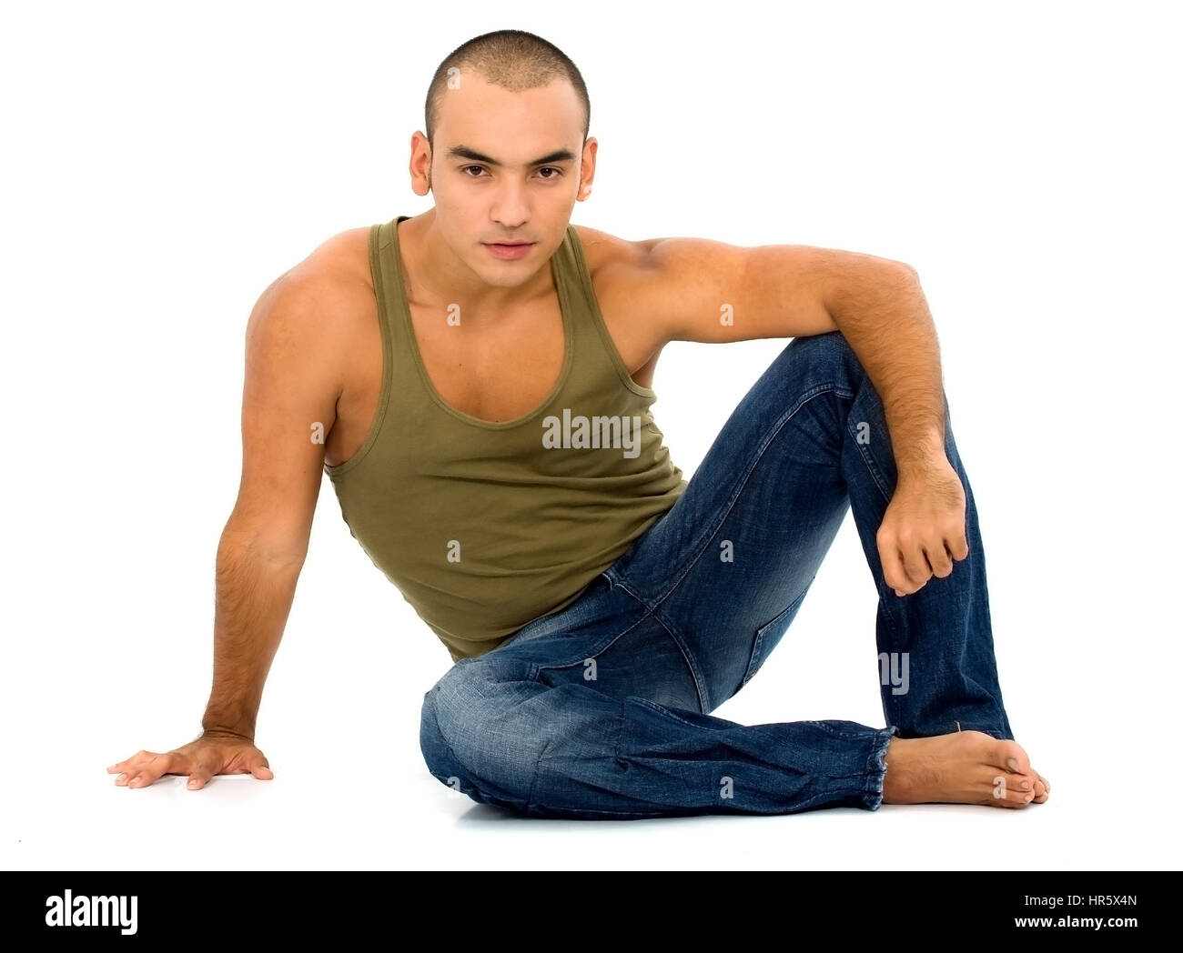 casual man portrait on the floor - isolated over a white background ...