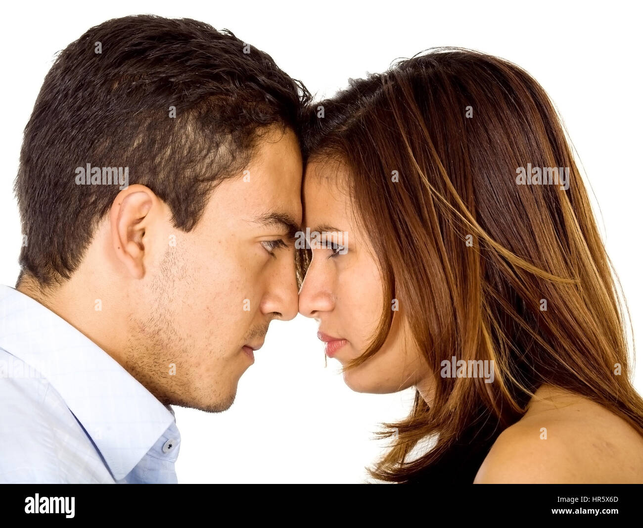 Couple going head to head in an argument isolated over a white
