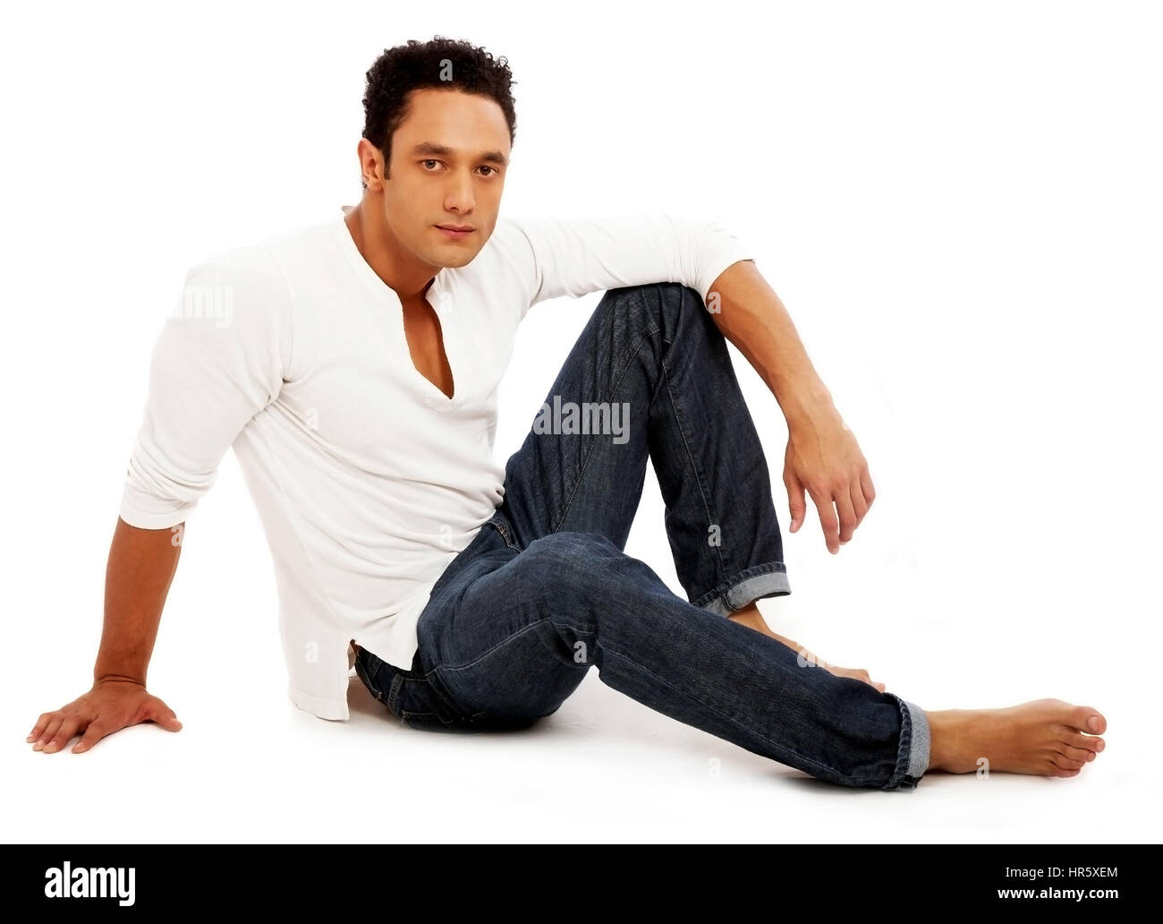 casual man on the floor isolated over a white background Stock Photo ...