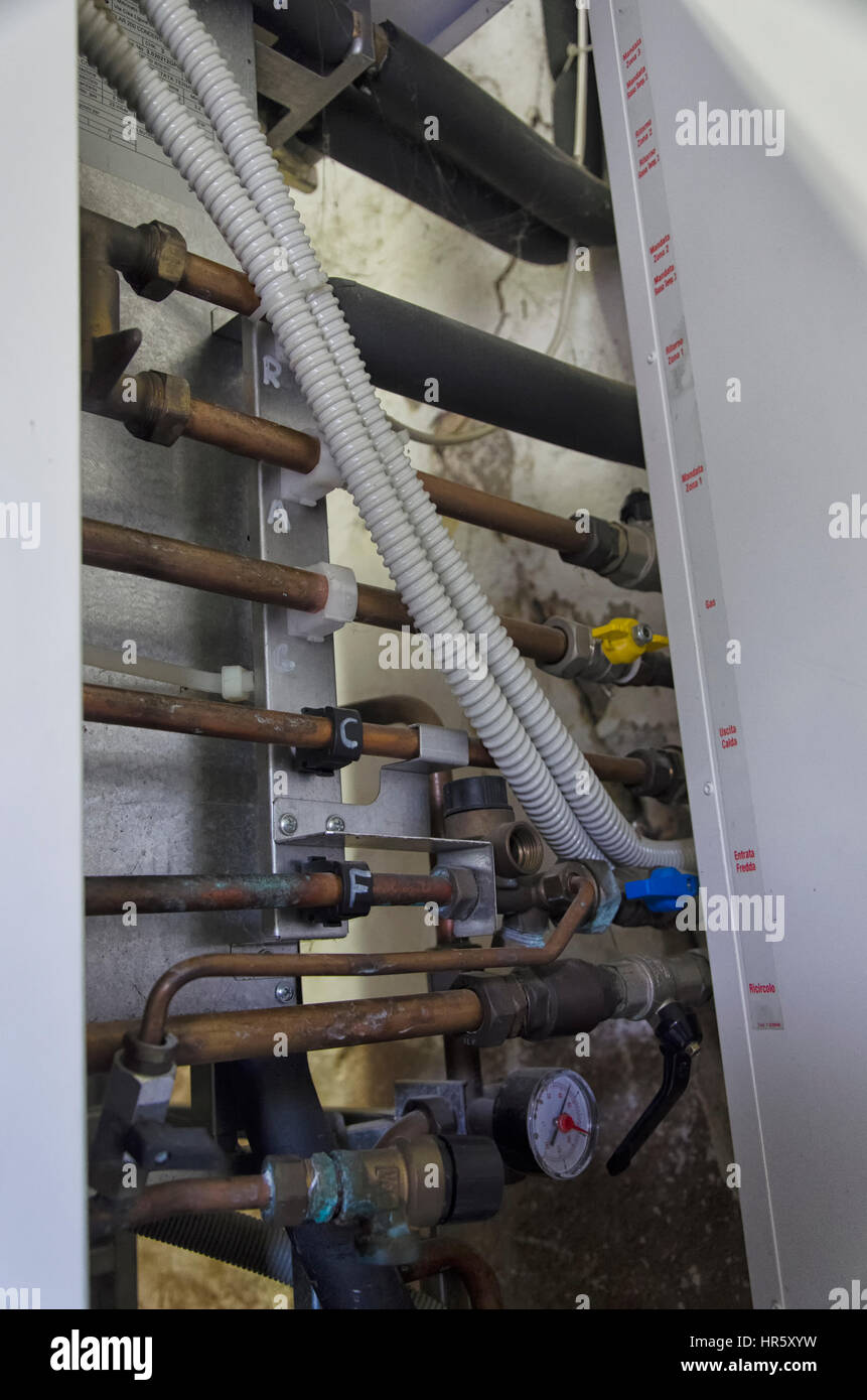 Copper tubes and knobs inside a boiler Stock Photo Alamy