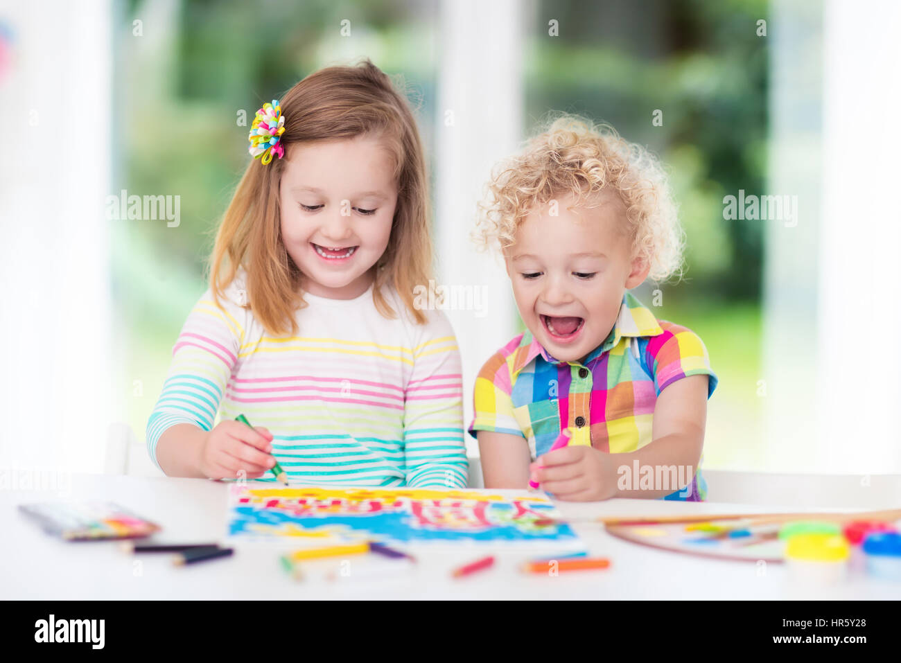 Little Boy And Girl Draw Together In White Room With Window Kids Doing Homework Painting And Drawing Children Paint With Paintbrush Color And Penci Stock Photo Alamy Little Boy And Girl Draw Together In White Room With Window Kids Doing Homework Painting And Drawing Children Paint With Paintbrush Color And Penci Stock Photo Alamy
