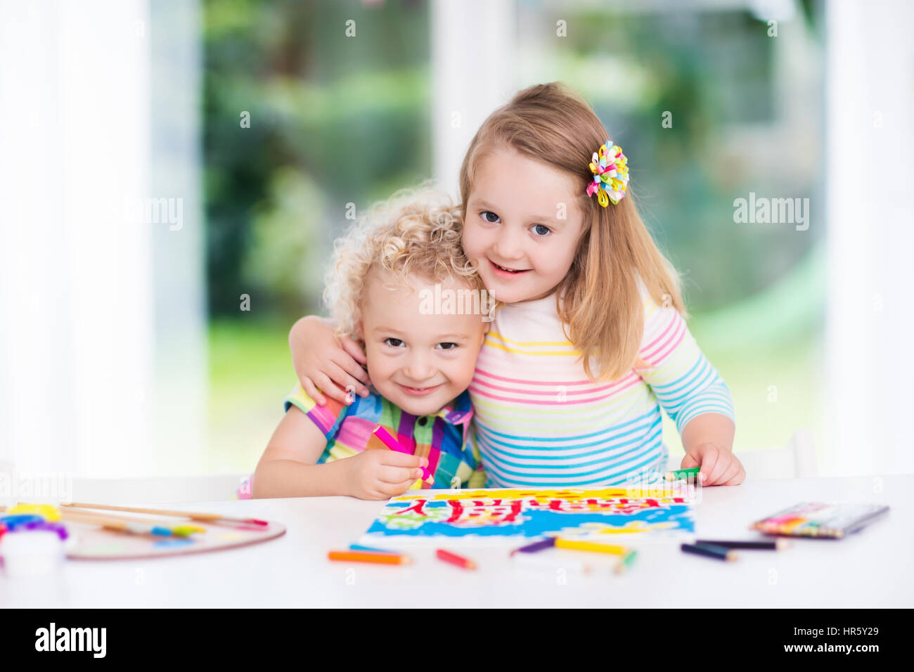 Little Boy And Girl Draw Together In White Room With Window Kids Doing Homework Painting And Drawing Children Paint With Paintbrush Color And Penci Stock Photo Alamy Little Boy And Girl Draw Together In White Room With Window Kids Doing Homework Painting And Drawing Children Paint With Paintbrush Color And Penci Stock Photo Alamy