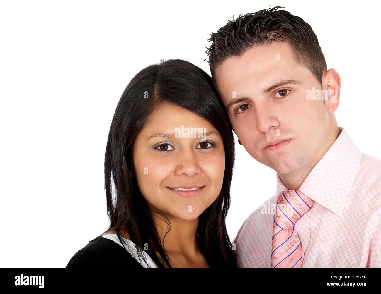 happy young couple portrait smiling isolated over a white background ...