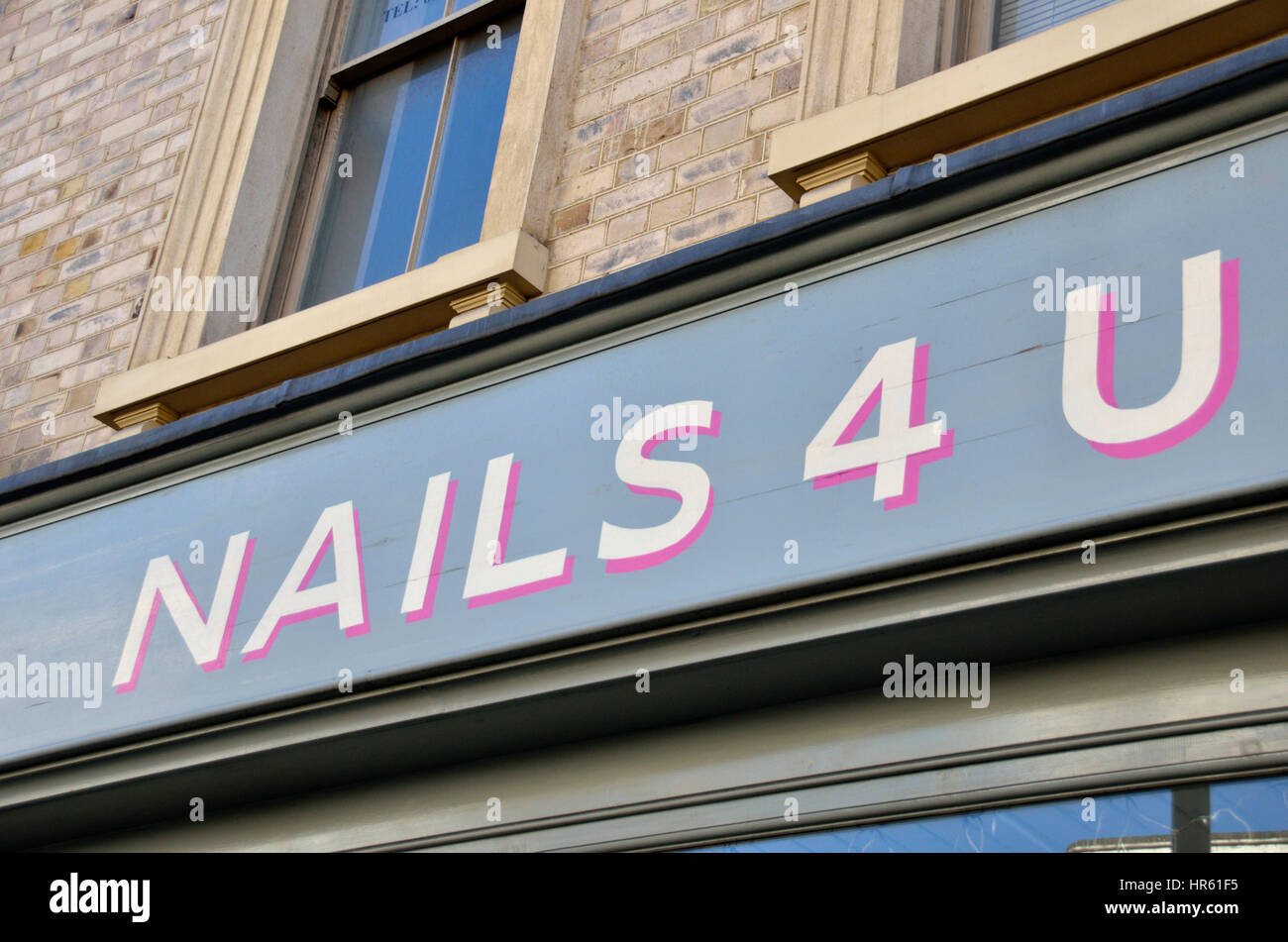 Nails 4 U sign outside a nail salon Stock Photo