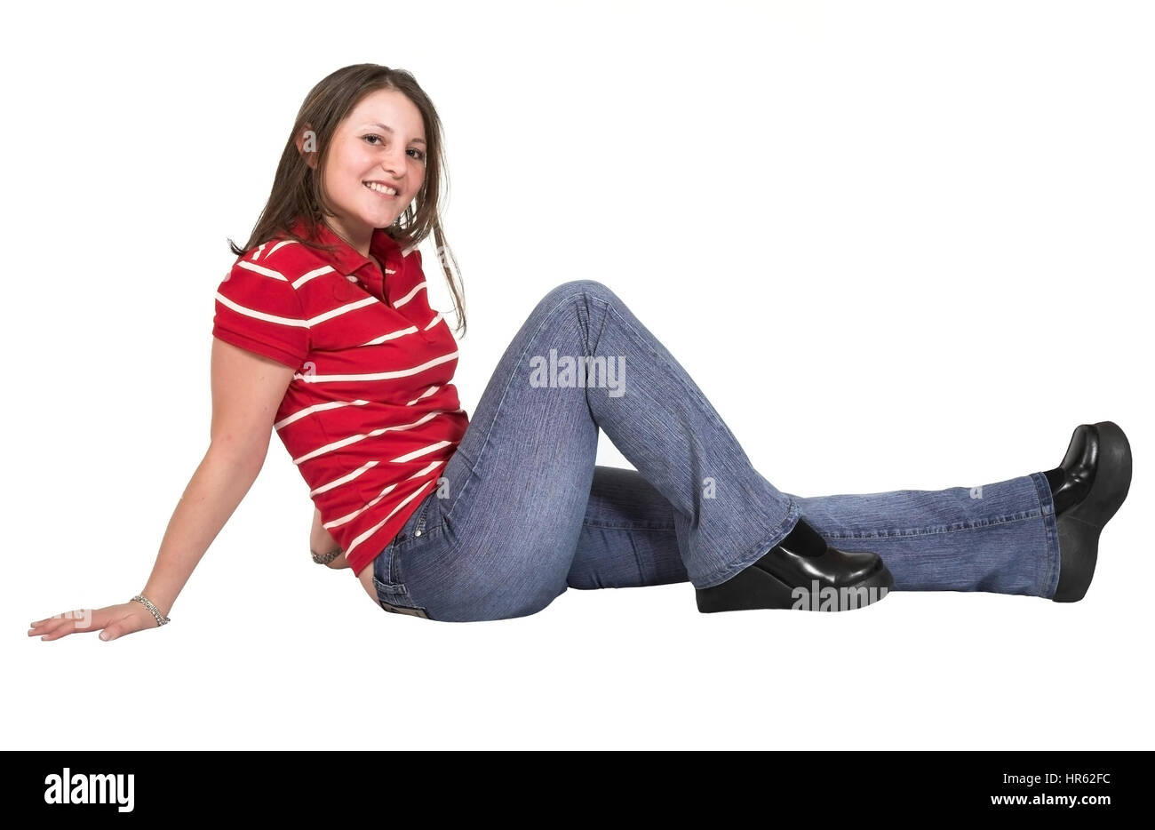 girl on the floor smiling over white Stock Photo - Alamy