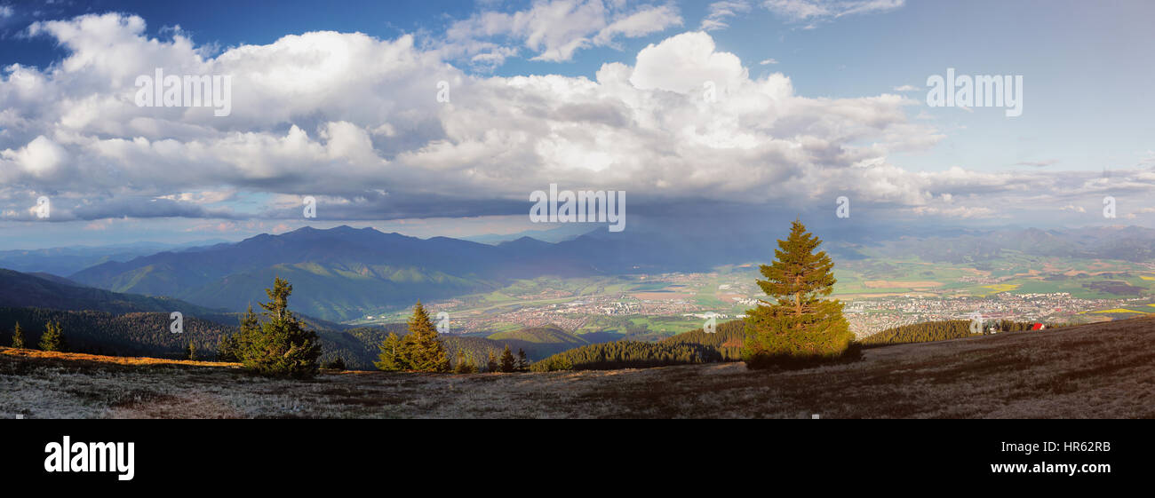 Spring mountain landscape. Panorama of valley under clouds. Sunny ...