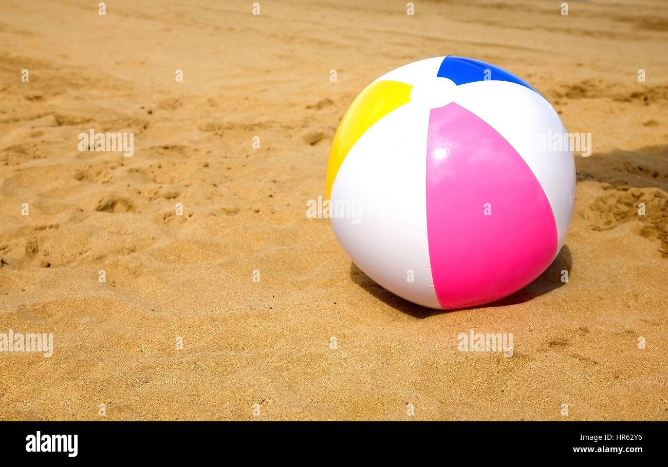 ball on the beach on a sunny day Stock Photo