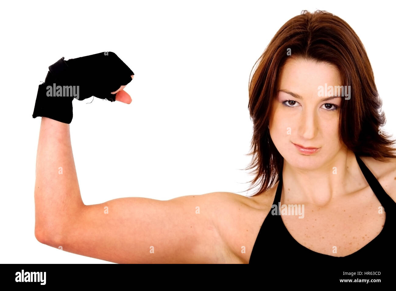 Portrait of young fitness woman shows biceps. Stock Photo by ©kopitin  86236174