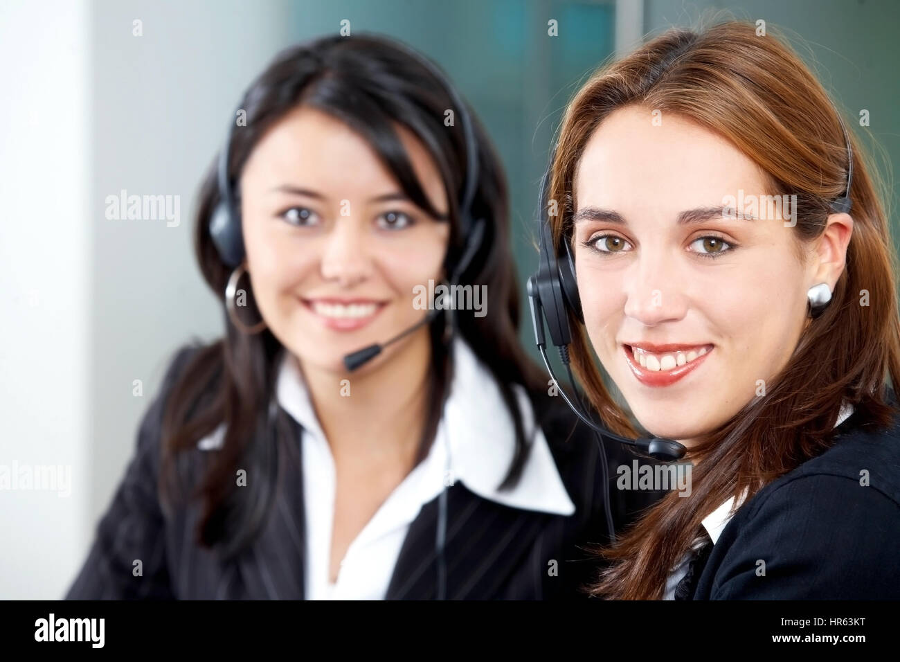 customer service secretaries in an office environment Stock Photo