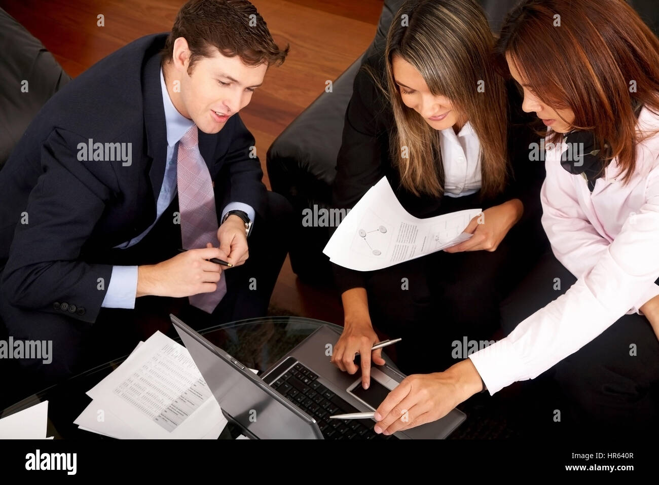 business meeting in an office with businessmen and businesswomen Stock ...