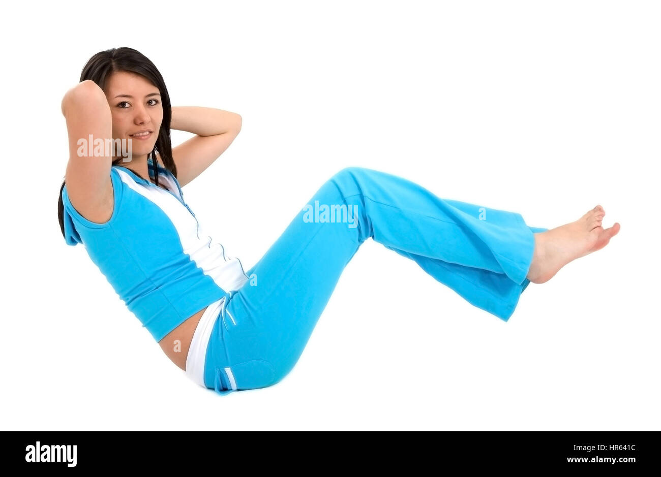 gym woman doing abs isolated over a white background Stock Photo - Alamy