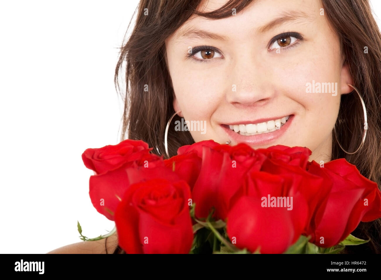 fashion portrait of girl with red roses over a white background Stock ...