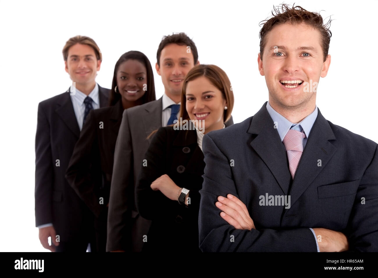 Business team smiling isolated over a white background Stock Photo - Alamy