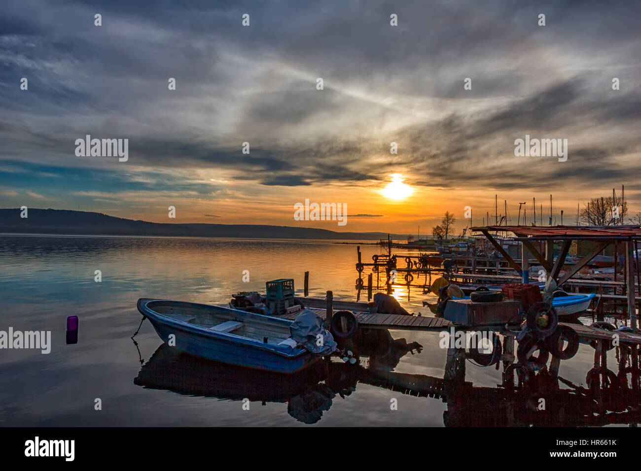 Beautiful sunset boats sea waves hi-res stock photography and images ...