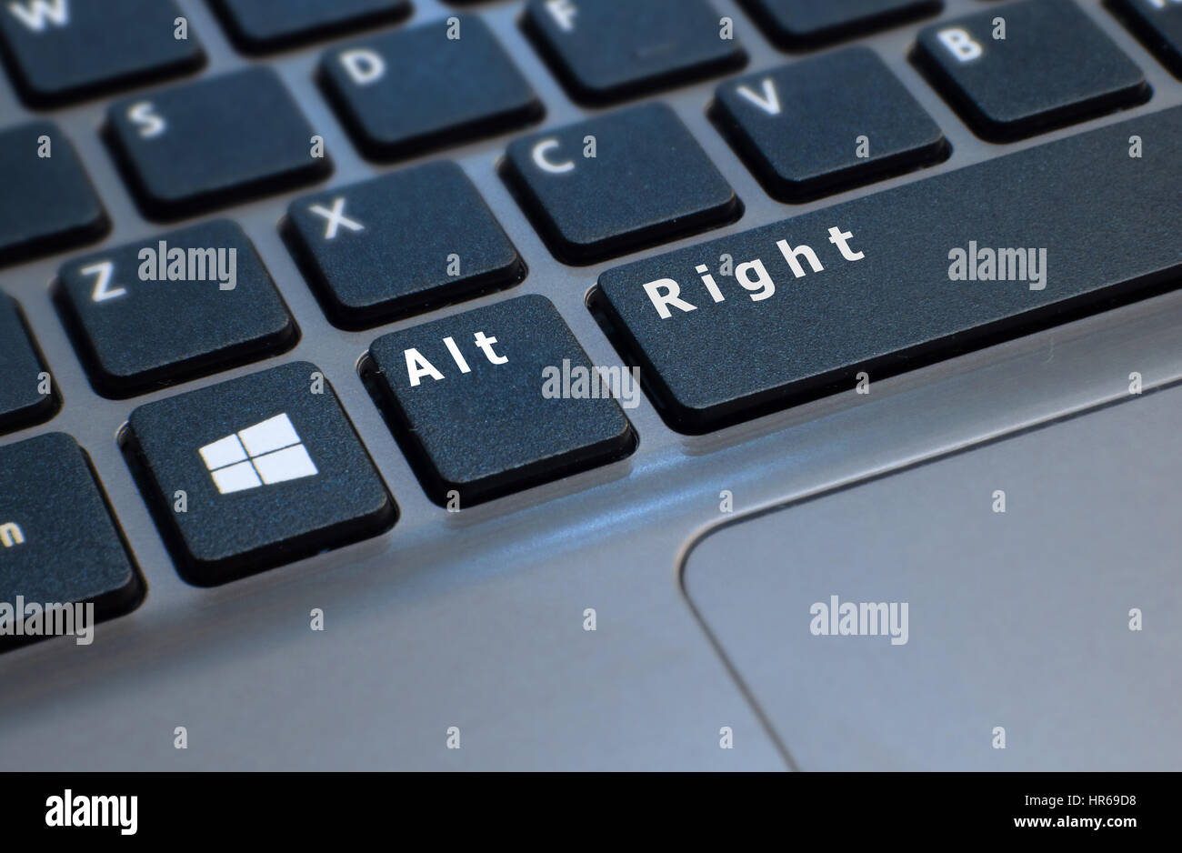 A photo of a laptop computer keyboard retouched to show keys reading Alt Right. Referencing the new extreme right-wing movement in Politics Stock Photo