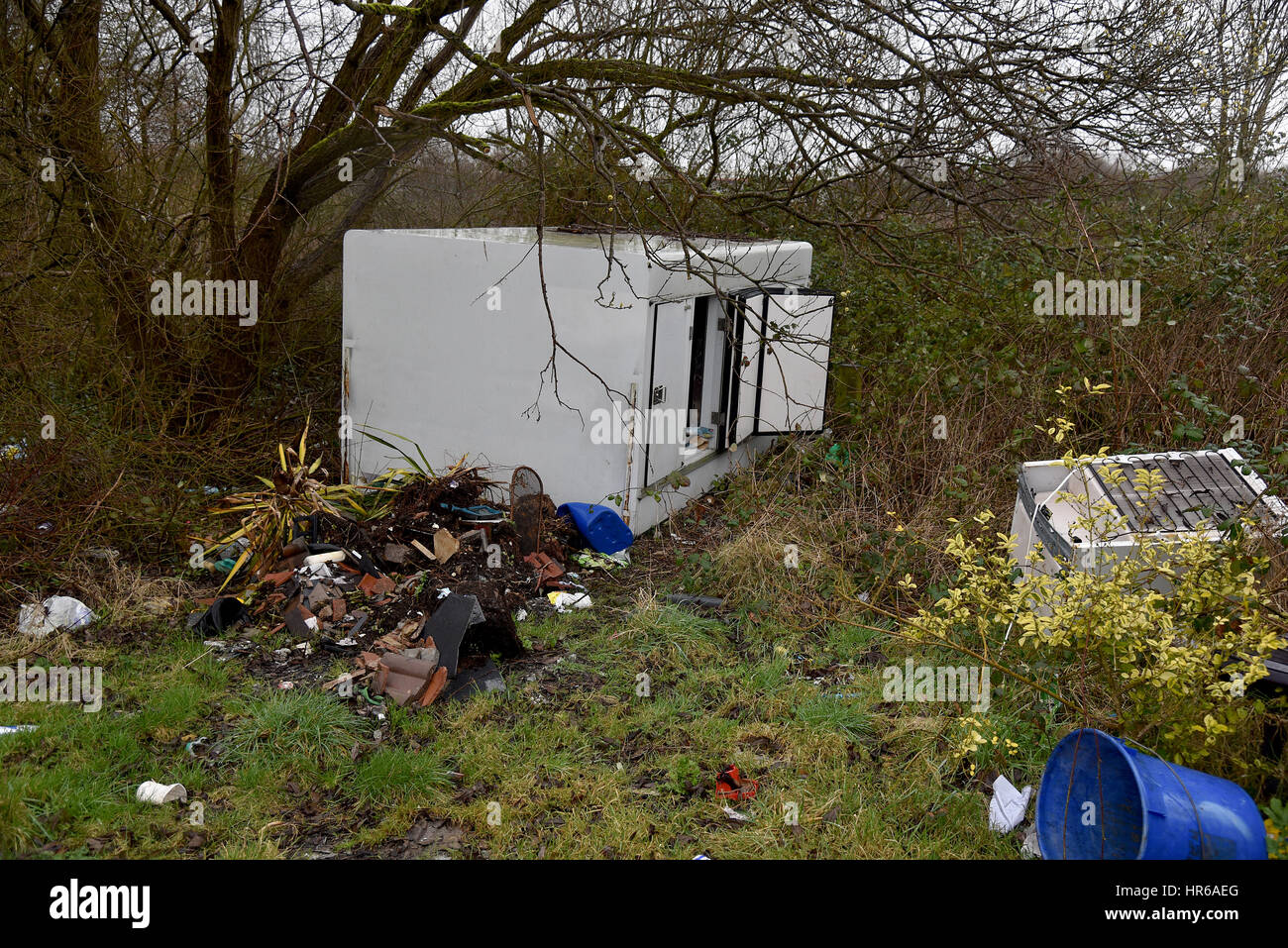 Travellers site, Tatton Road, Newport, South Wales. Smashed up caravans and fly-tipping, black bags and human waste left on the site. Stock Photo