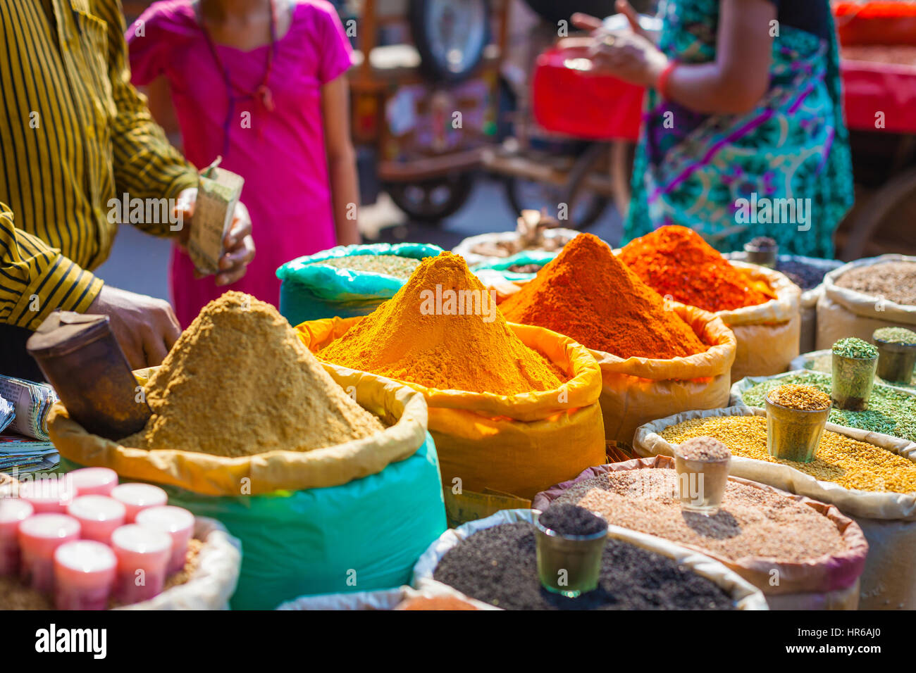 Colorful spices powders and herbs in traditional street market in Delhi. India. - Stock Image