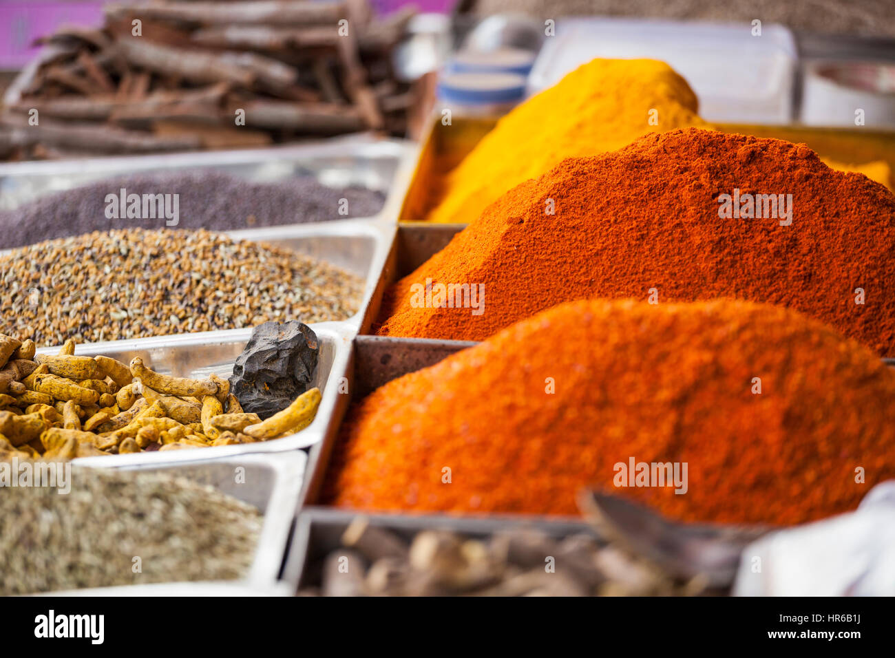 Colorful spices powders and herbs in traditional street market in Delhi. India. Stock Photo