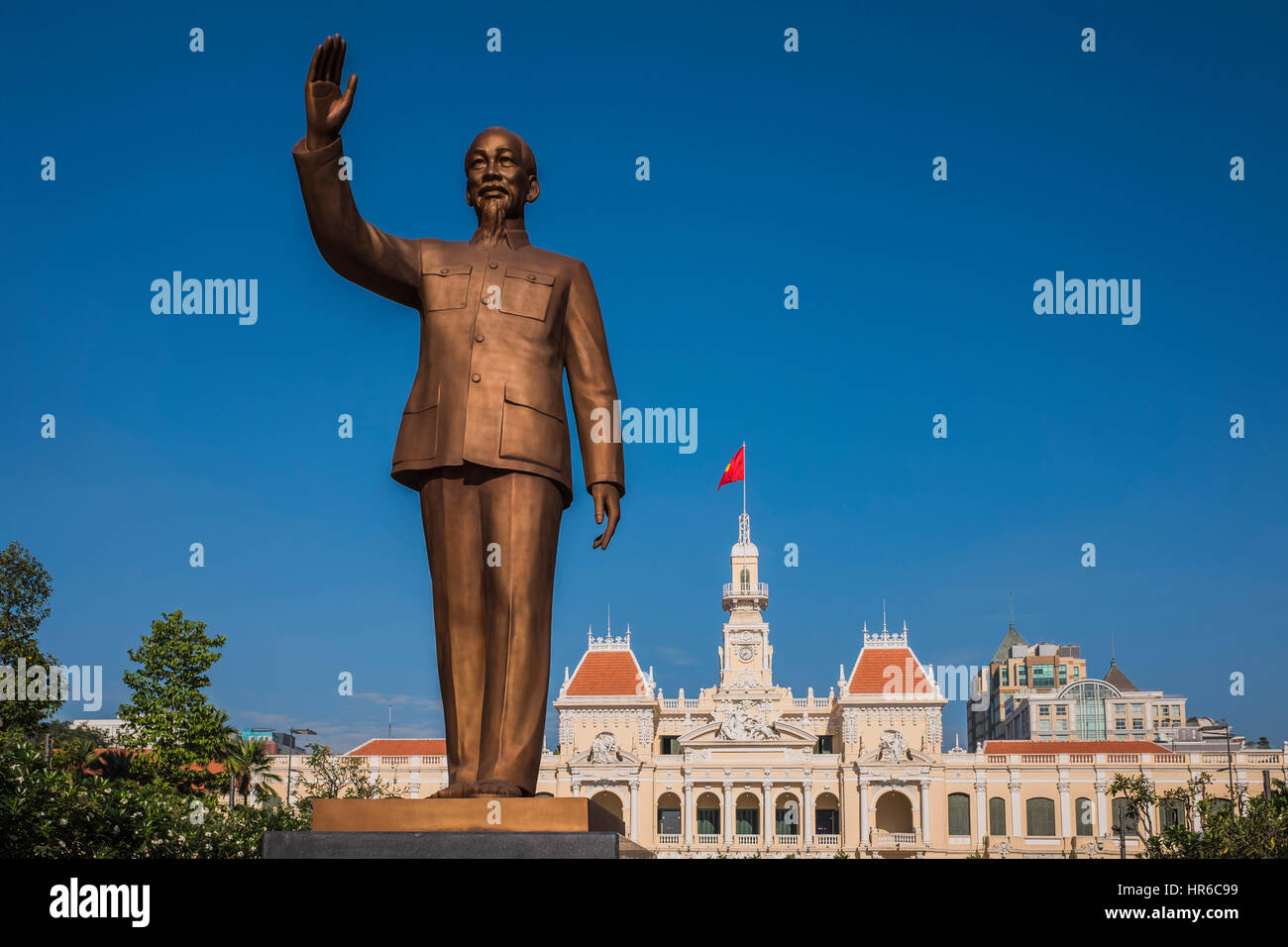Ho Chi Minh statue in front of the Hotel De Ville, Ho Chi Minh City, Vietnam Stock Photo
