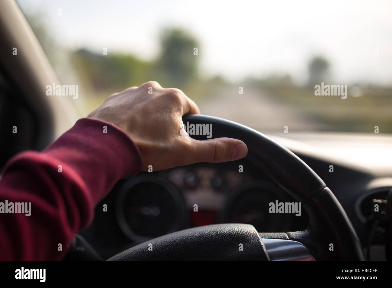 Drivers hand holding steering wheel hi-res stock photography and images ...
