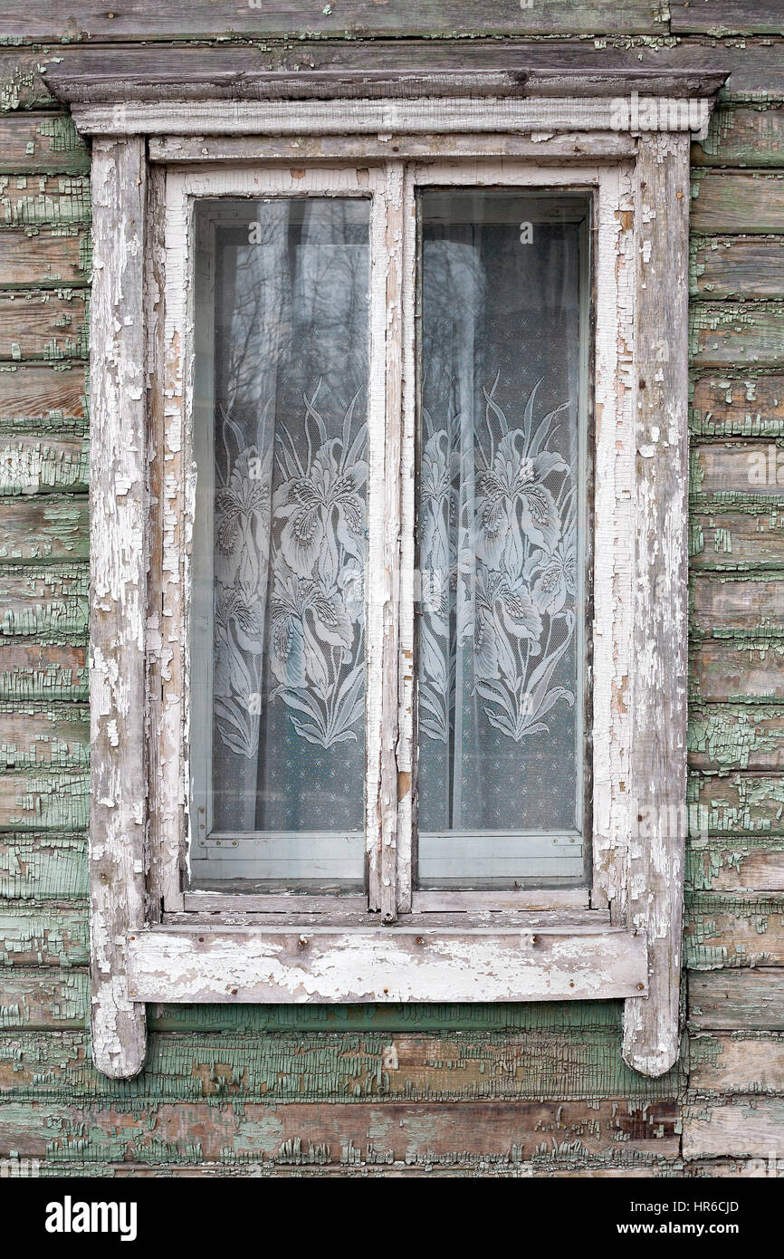 Old window on a aged wooden wall Stock Photo - Alamy