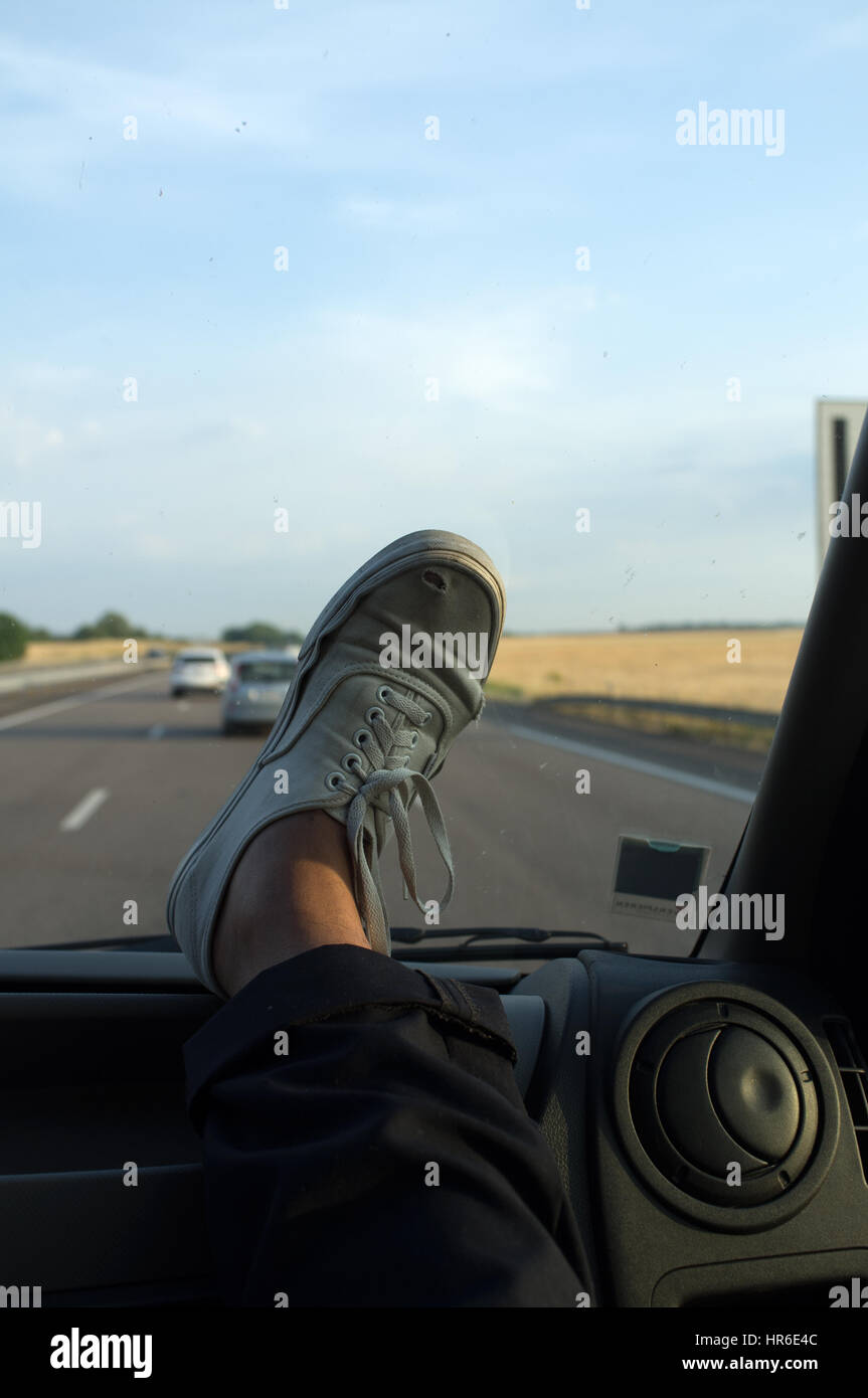 Feet on dashboard car on hires stock photography and images Alamy