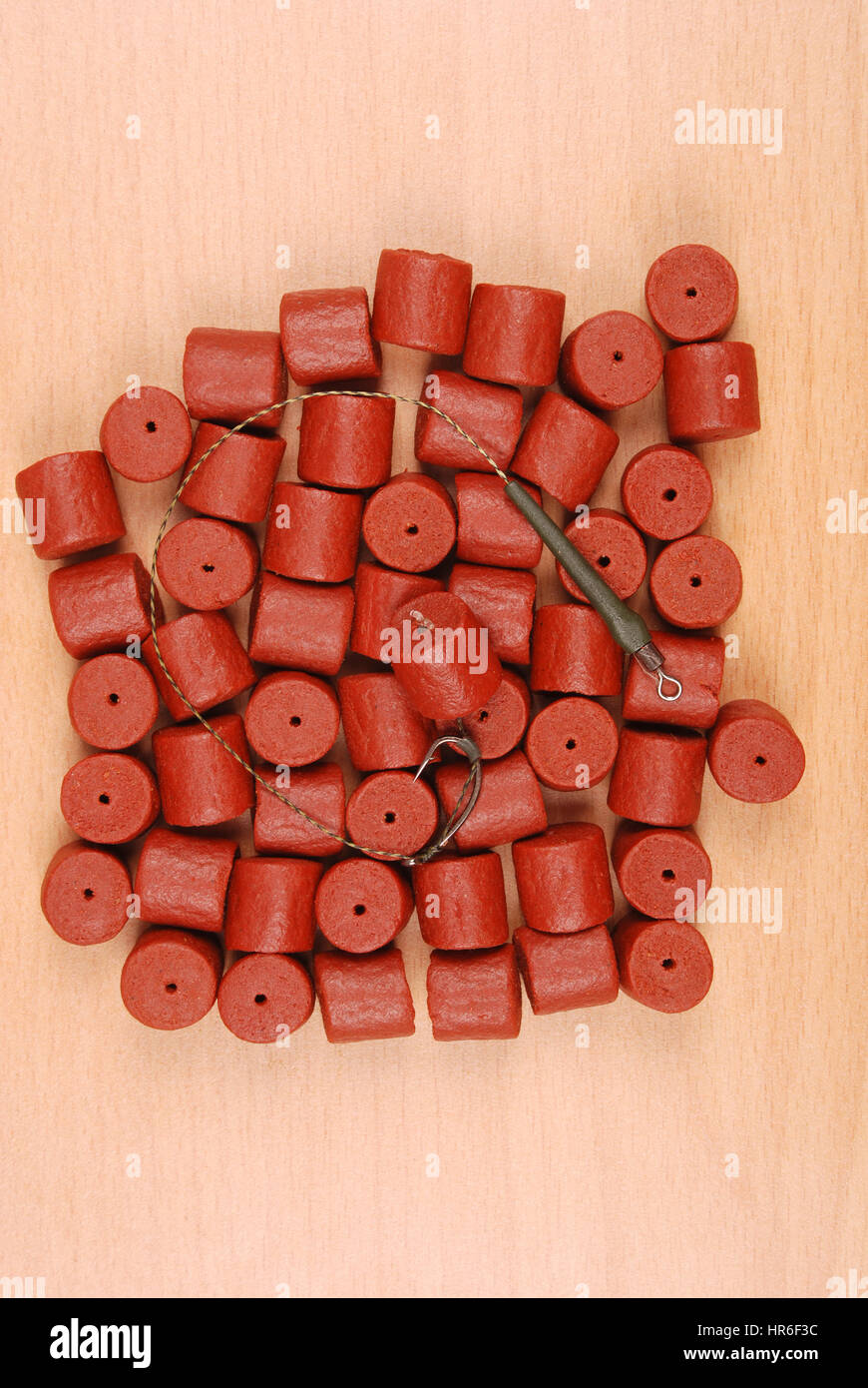 Red pre drilled halibut pellets carp hi-res stock photography and images -  Alamy