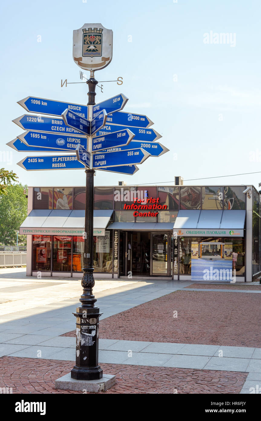 Blue directional signs in front of Tourist Information Center in Plovdiv, Bulgaria Stock Photo