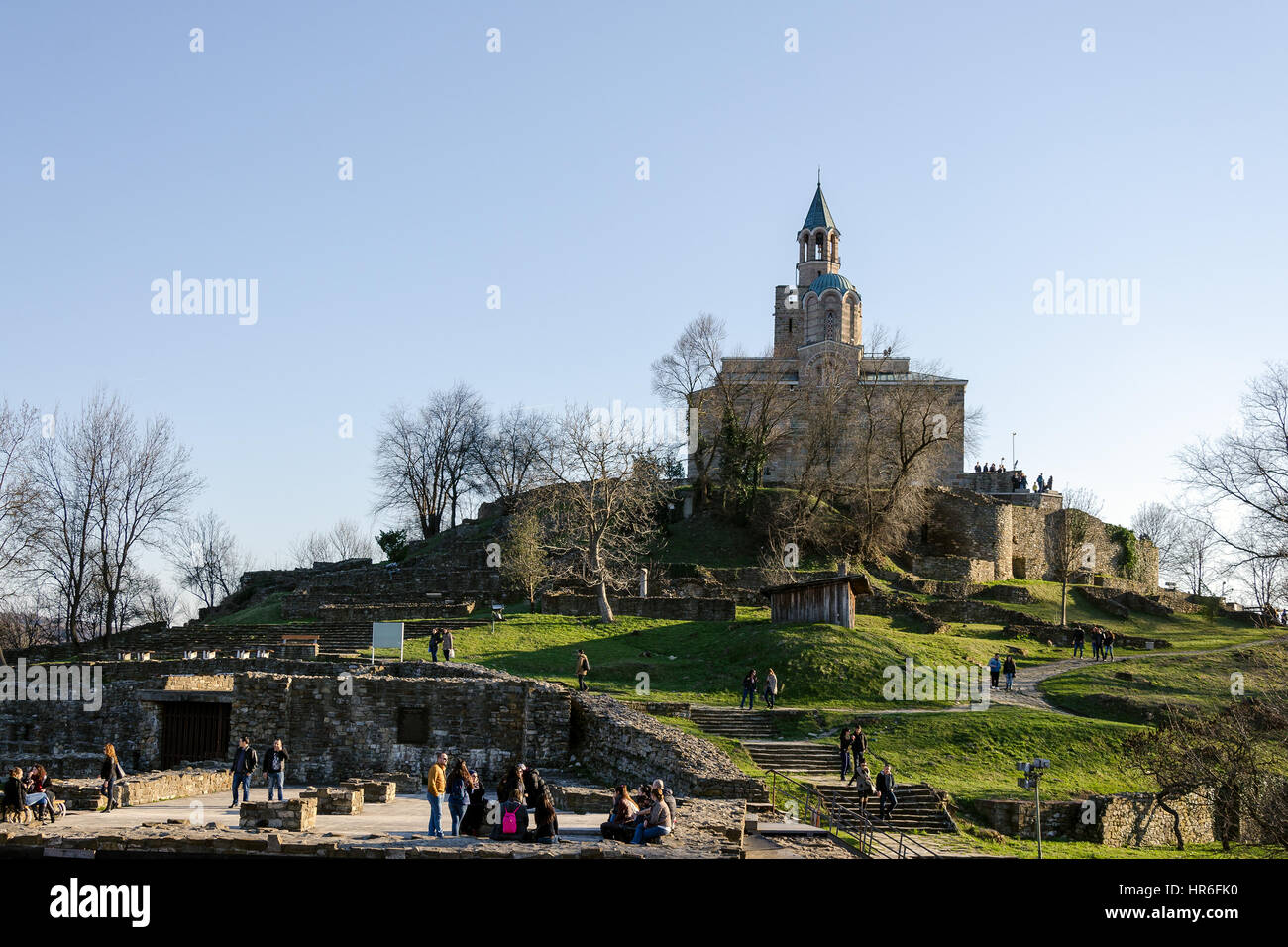 Patriarchal church at Tsarevets fortress and tourists, Veliko Tarnovo, Bulgaria Stock Photo