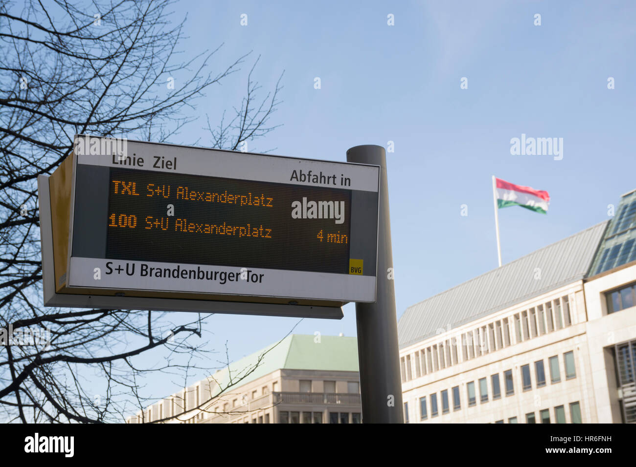 Sign at bus stop near Brandenburg gate, Berlin, Germany Stock Photo