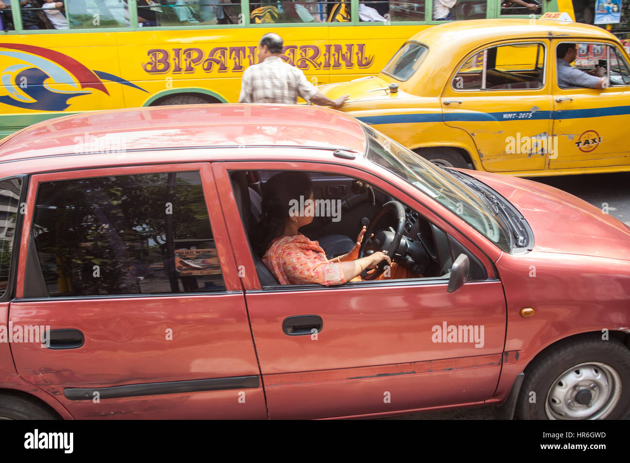 Ambassador,yellow,taxi,transport,Calcutta,Kolkata,West,Bengal,West Bengal,India,Indian,Asia,Asian, Stock Photo