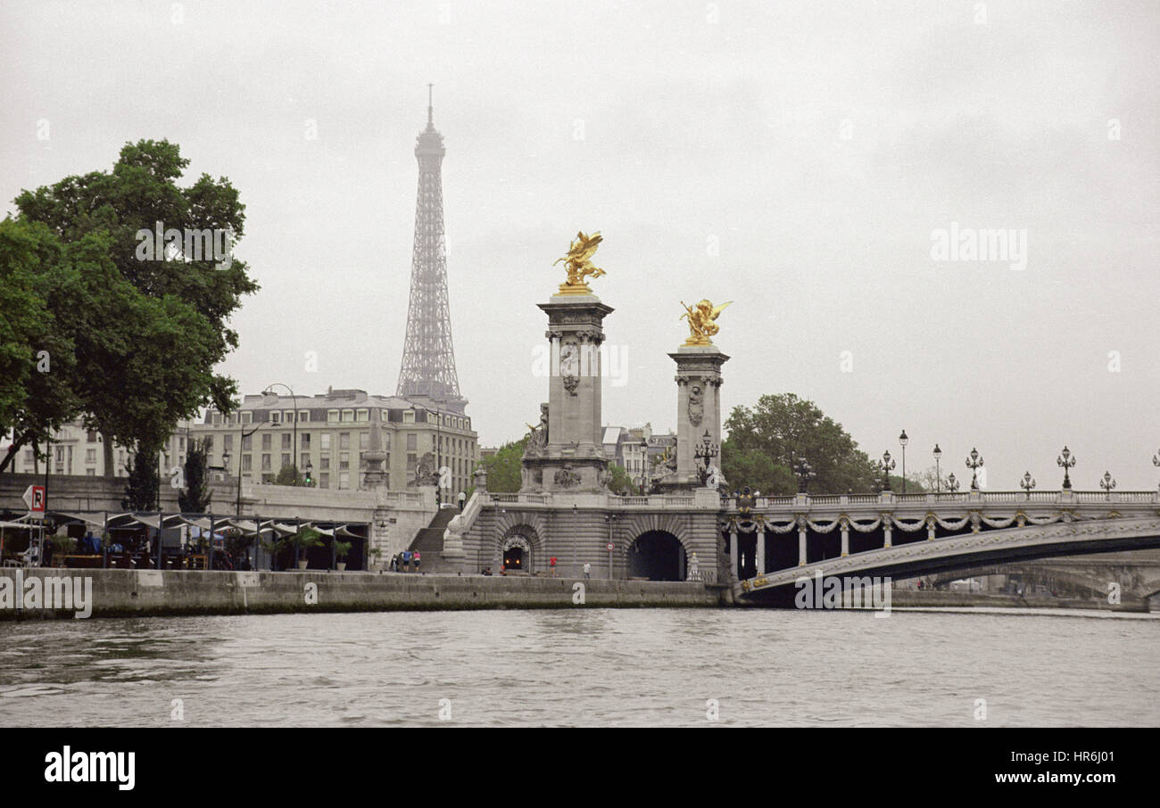 The Pont Alexandre III is one of the most ornate and extravagant bridges in Paris. Stock Photo