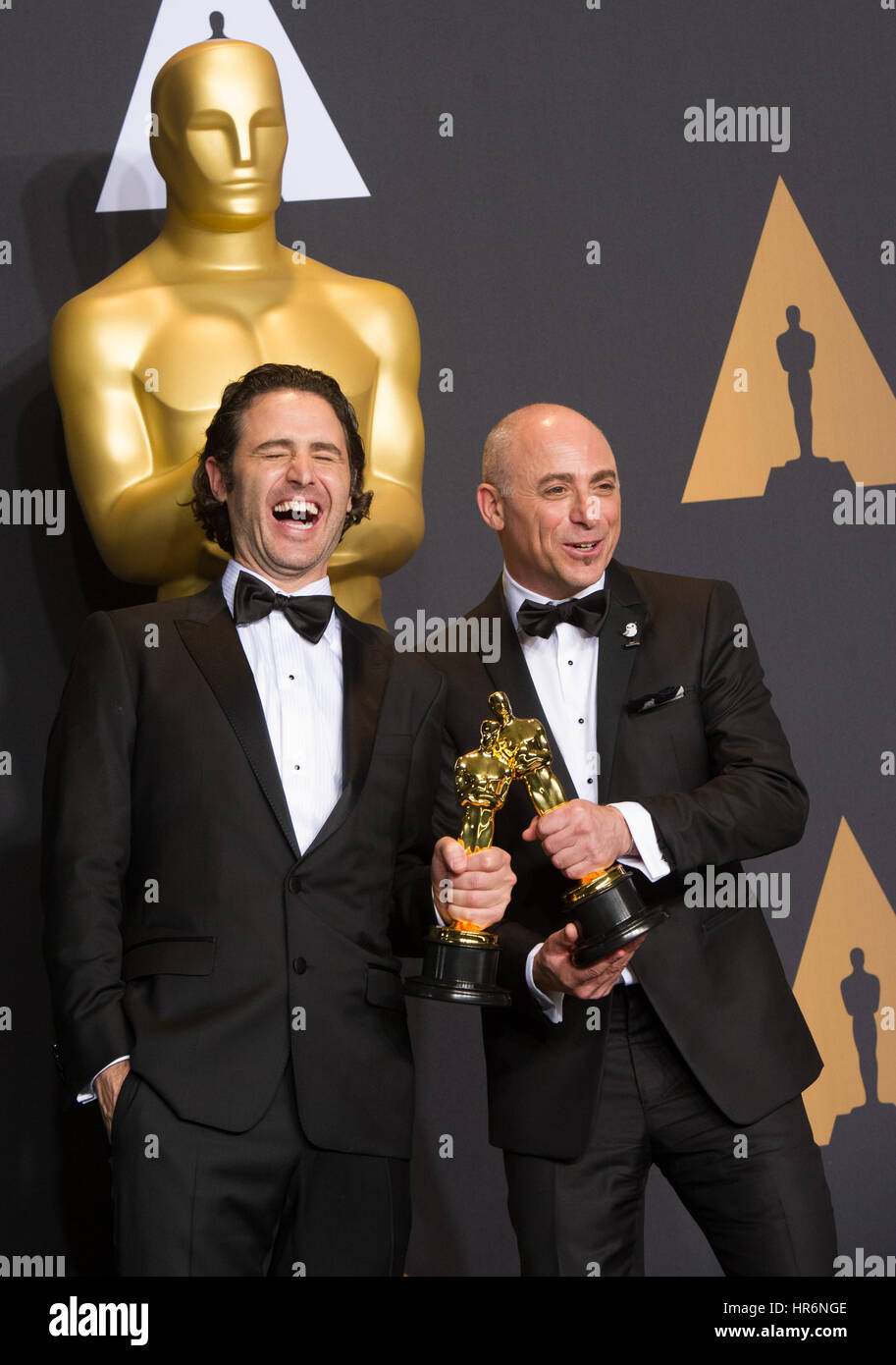 Los Angeles, USA. 26th Feb, 2017. Director Alan Barillaro and producer Marc Sondheimer pose after winning the Best Animated Short Film award for 'Piper' at press room of the 89th Academy Awards at the Dolby Theater in Los Angeles, the United States, on Feb. 26, 2017. Credit: Yang Lei/Xinhua/Alamy Live News Stock Photo