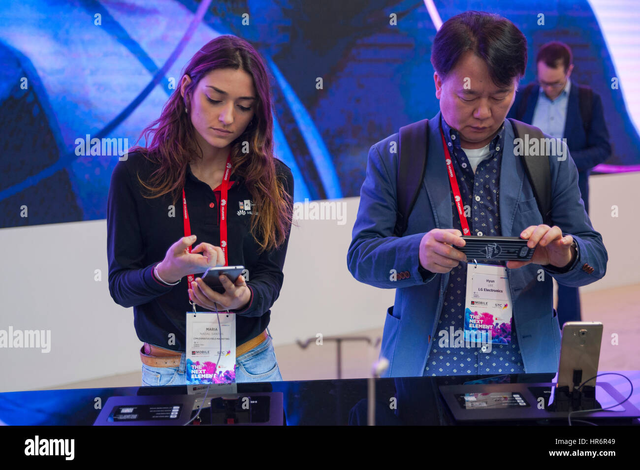 Barcelona, Spain. 27th Feb, 2017. Visitors testing a Huawei P10 during the Mobile World Congress wireless show in Barcelona. The annual Mobile World Congress hosts some of the world's largest communications companies, with many unveiling their latest phones and wearables gadgets. Credit: Charlie Perez/Alamy Live News Stock Photo