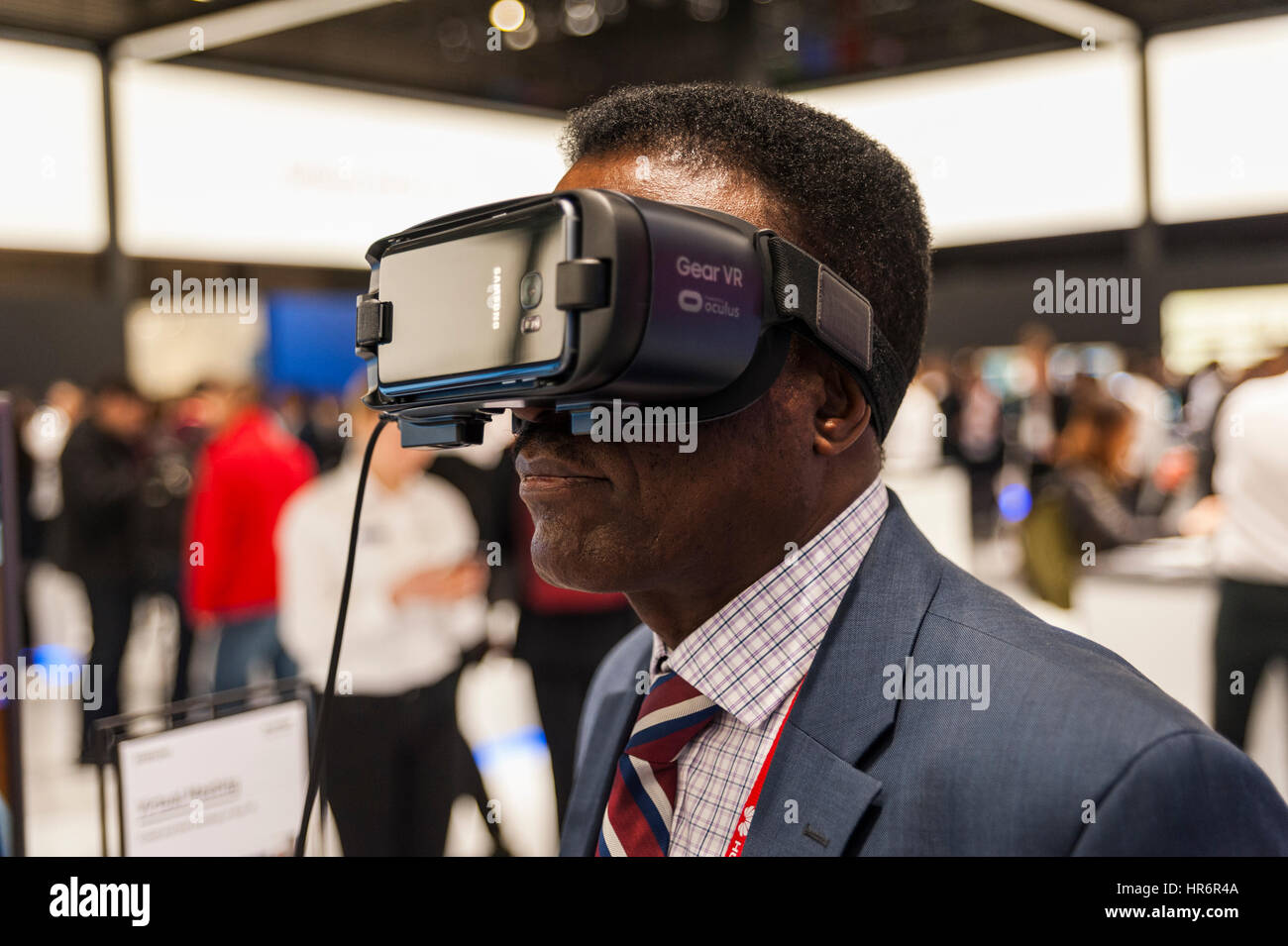 Barcelona, Spain. 27th Feb, 2017. Visitor testing a Samsung Gear VR glasses during the Mobile World Congress wireless show in Barcelona. The annual Mobile World Congress hosts some of the world's largest communications companies, with many unveiling their latest phones and wearables gadgets. Credit: Charlie Perez/Alamy Live News Stock Photo