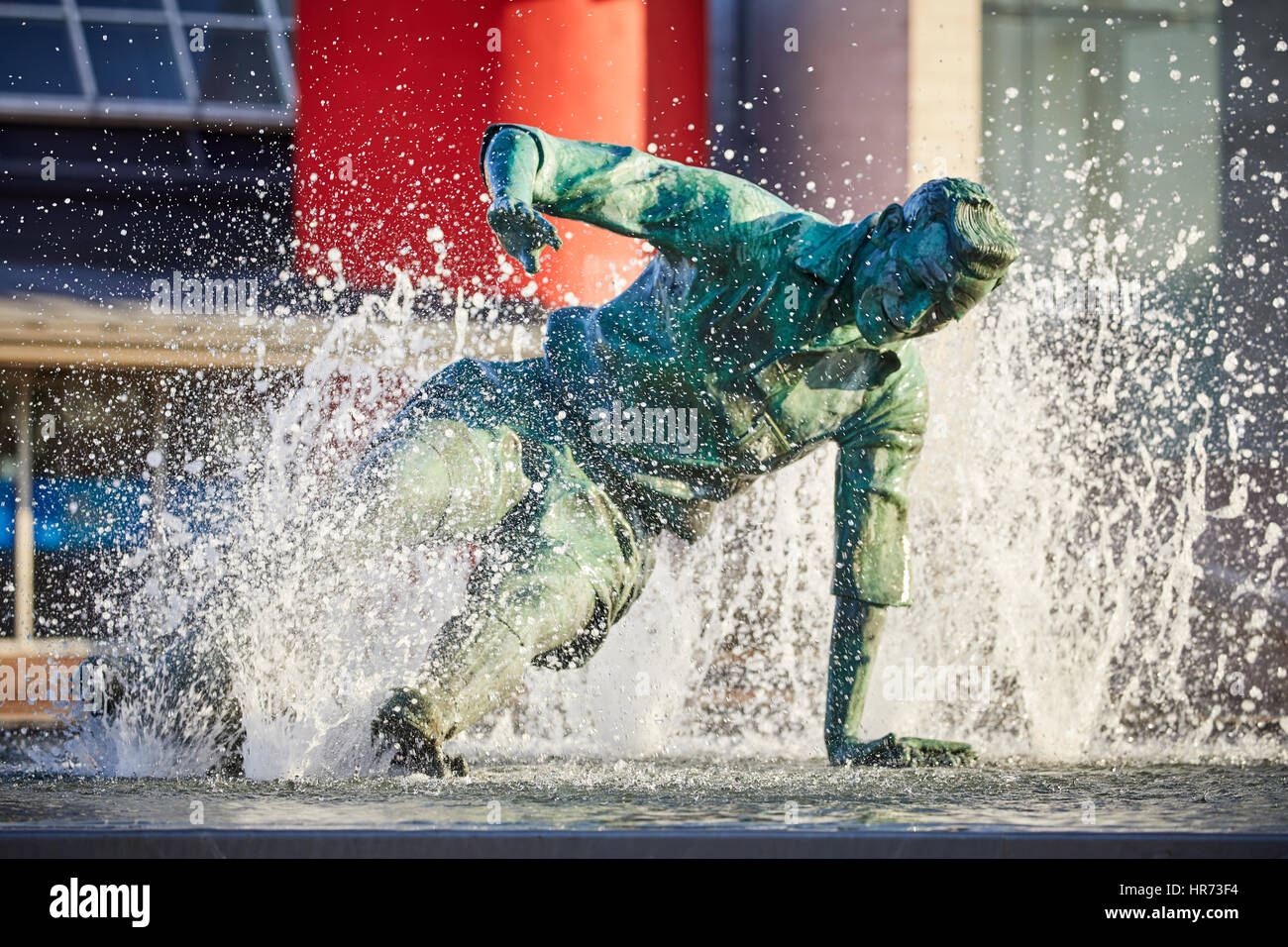 Preston FC  Deepdale stadium makes the backdrop for the landmark water feature Sir Tom Finney Statue  The Splash, by sculptor Peter Hodgkinson Stock Photo