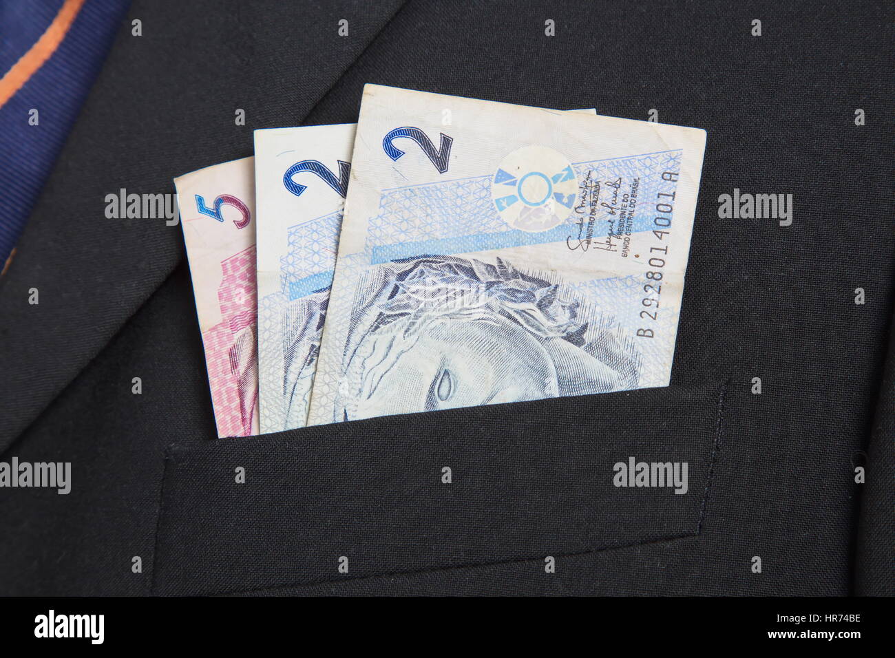 Brazilian Real in the pocket of a suit Stock Photo