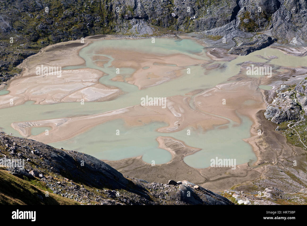 Glacial water from streams of Pasterze-Gletscher, Großglockner, Carinthia, Austria, Europe Stock Photo