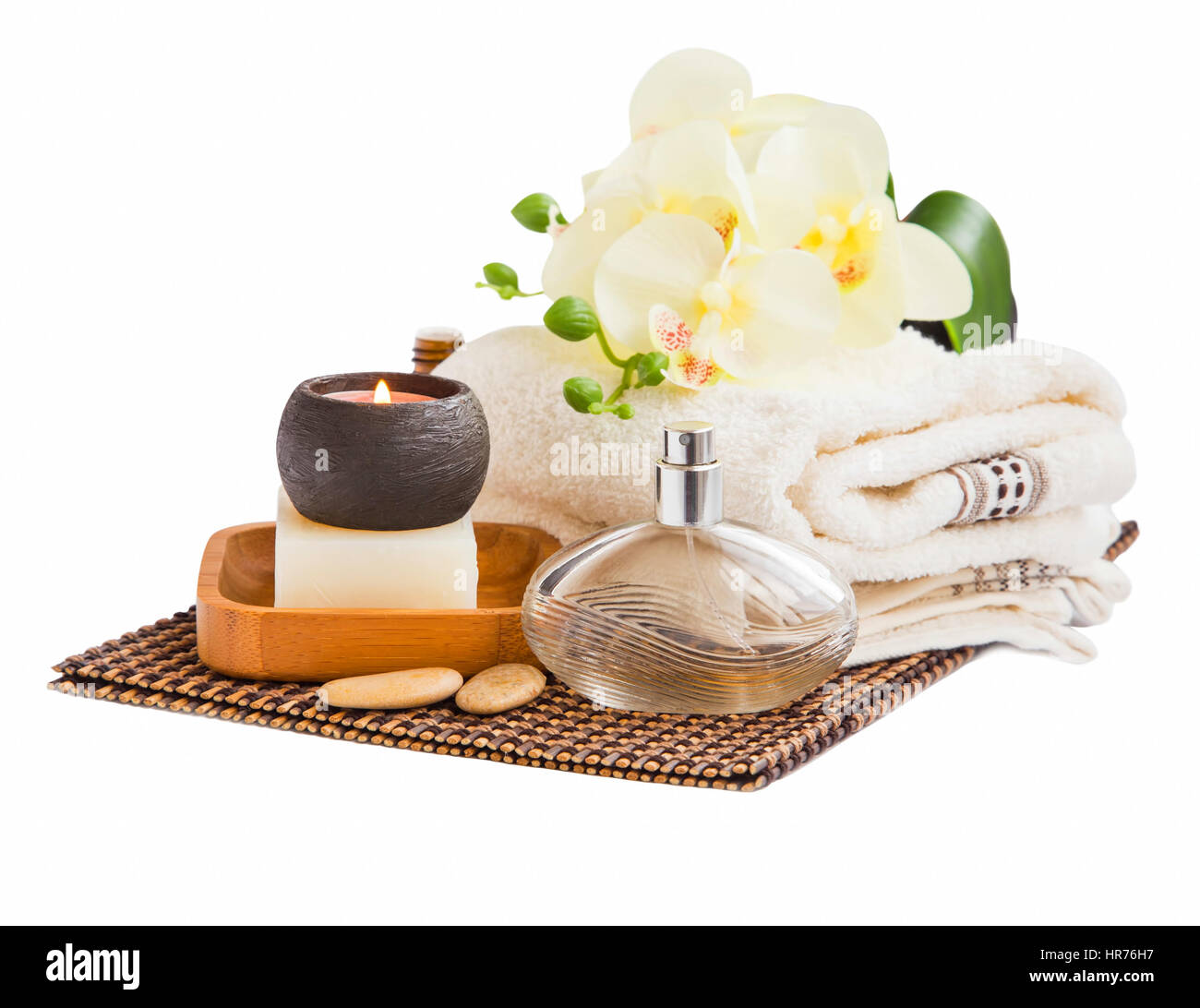 Spa still life with towels and orchid flower, towels,candle and natural soap Stock Photo