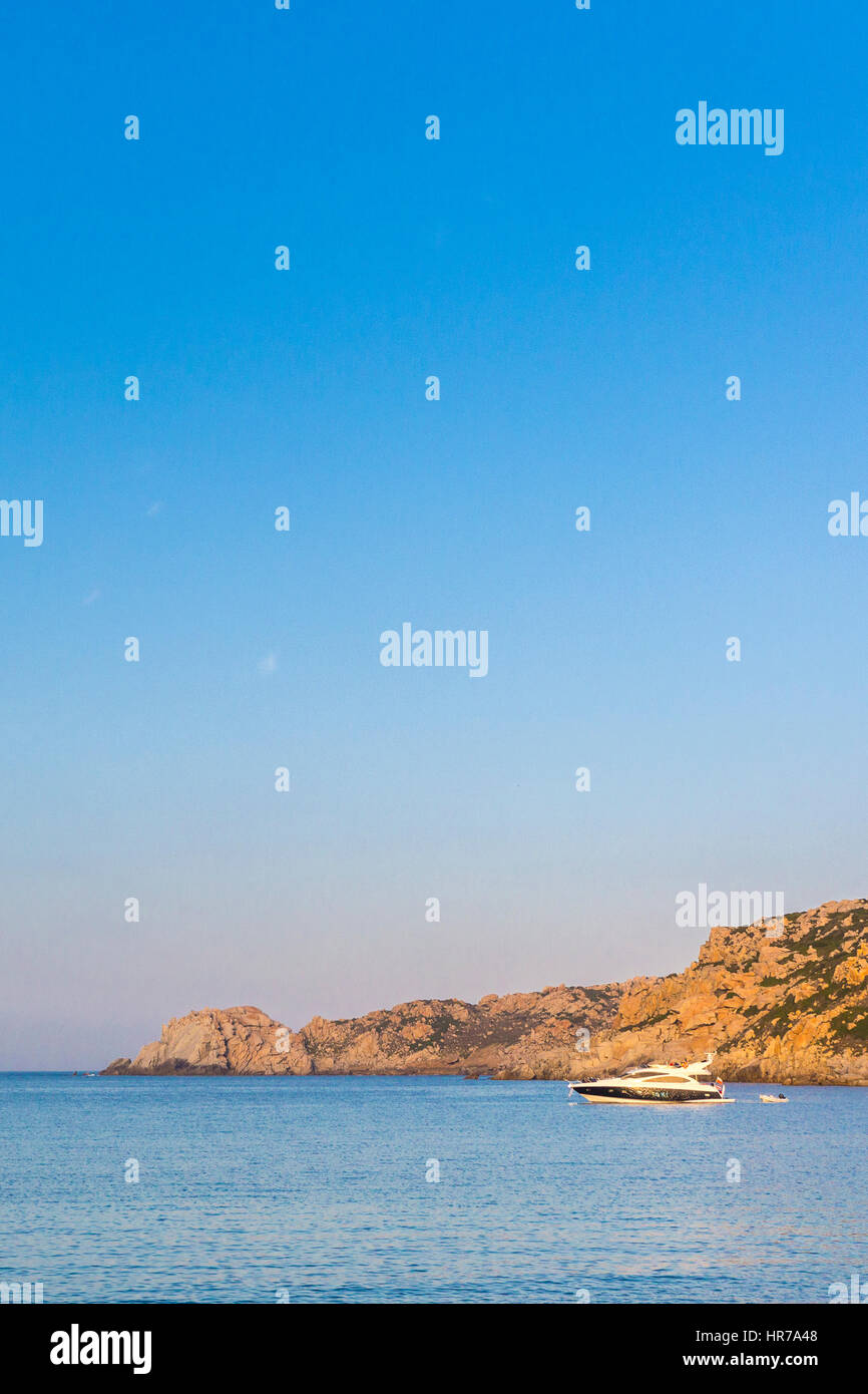 View of the luxury boat on Santa Reparata bay, Capo Testa, Santa Teresa di Gallura, Sassati Sardinia Stock Photo