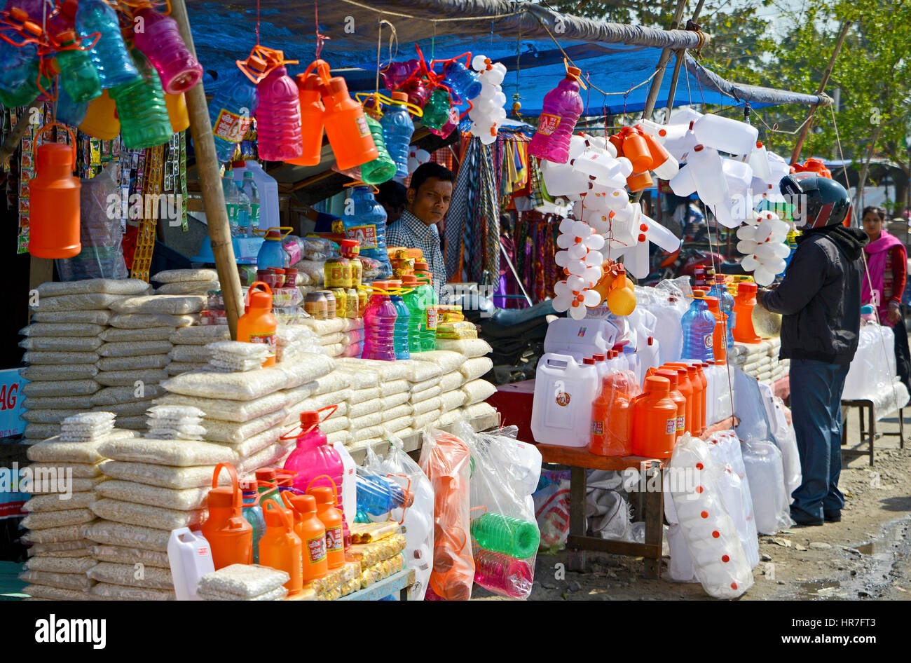 Local street vendor selling plastic products Stock Photo Alamy
