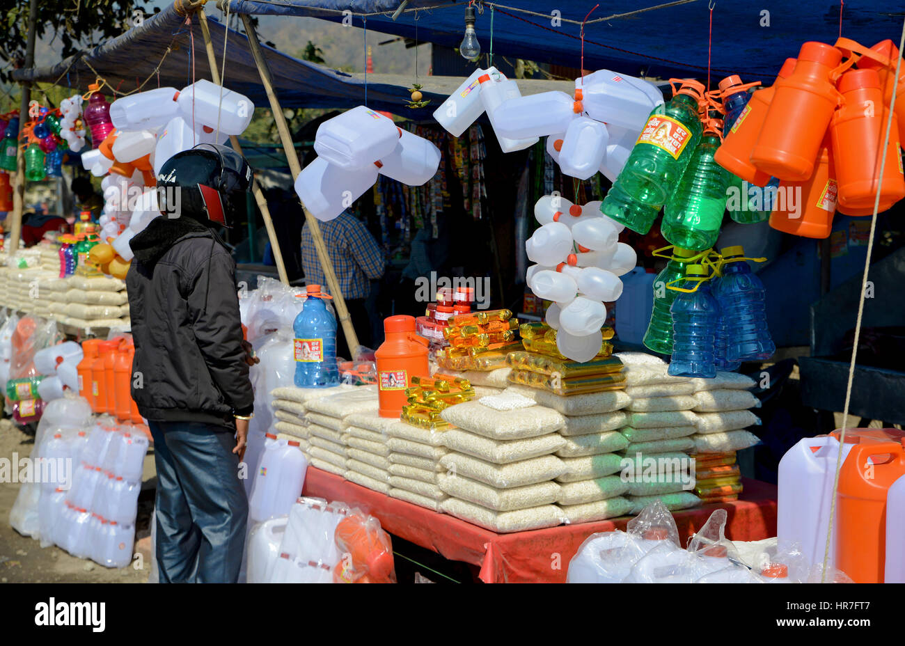 Local street vendor selling plastic products Stock Photo Alamy