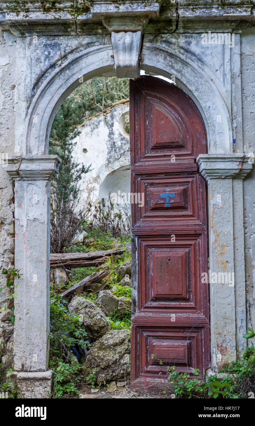 Traditional old stone arch doorway from an abandoned building. Stock Photo