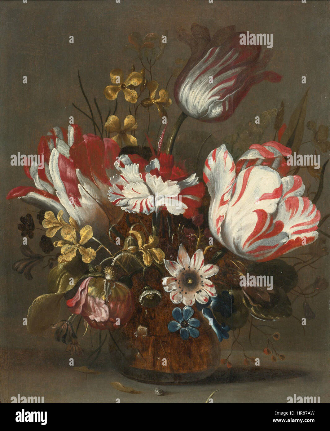 Tulips and other flowers in a glass vase Stock Photo - Alamy