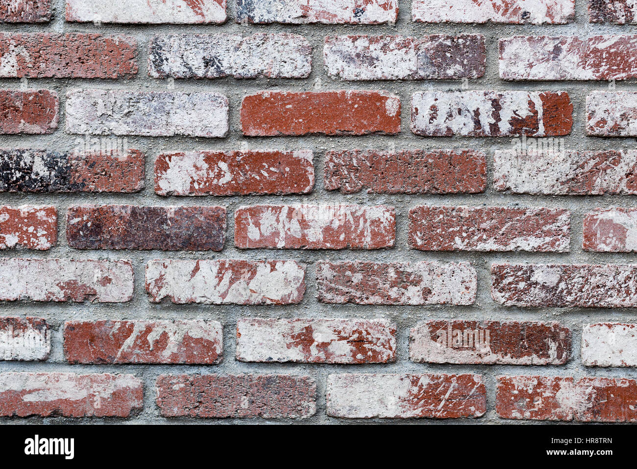 Weathered red brick wall background Stock Photo