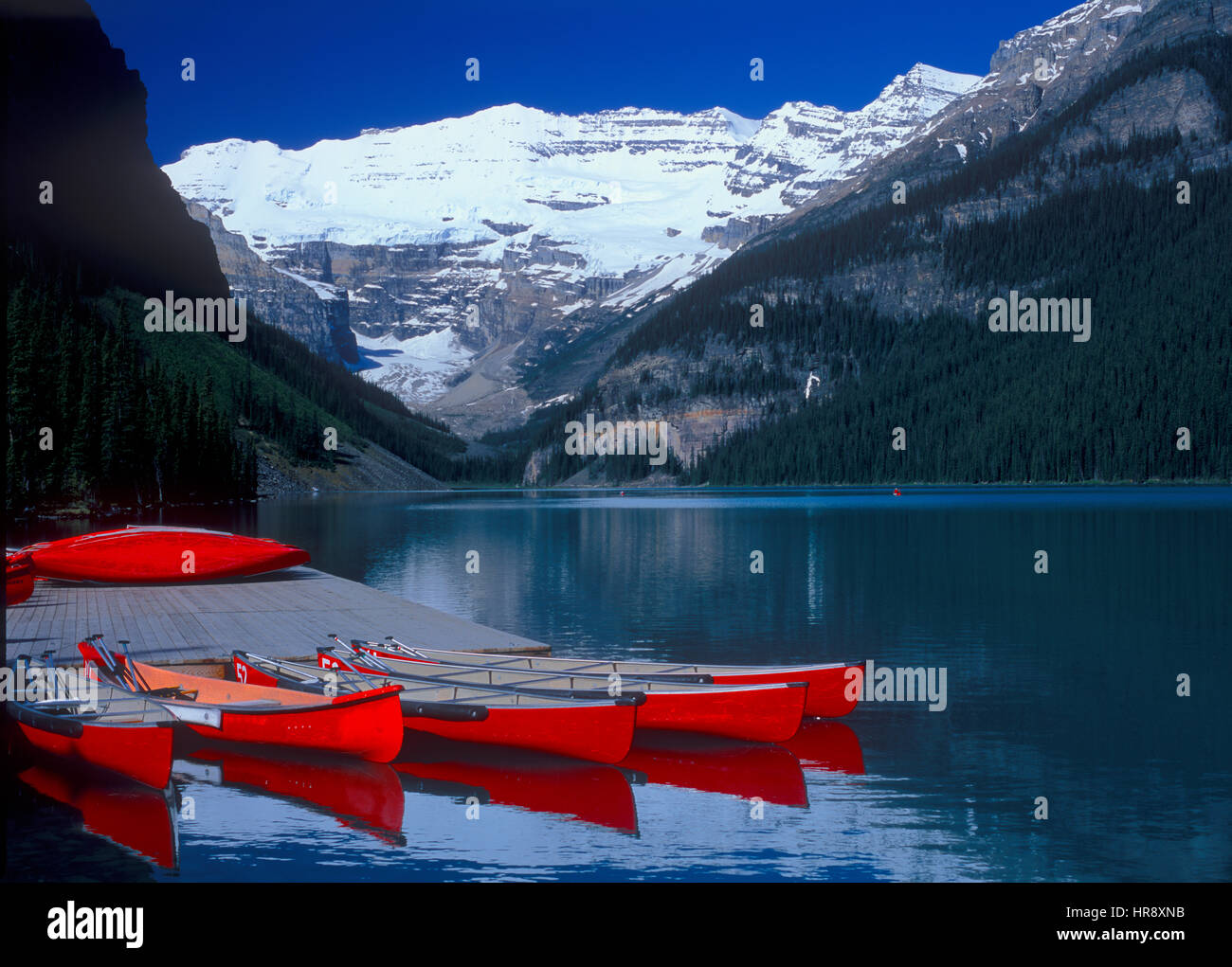 Red Canoes, Lake Louise, Banff National Park, Alberta, Canada Stock Photo